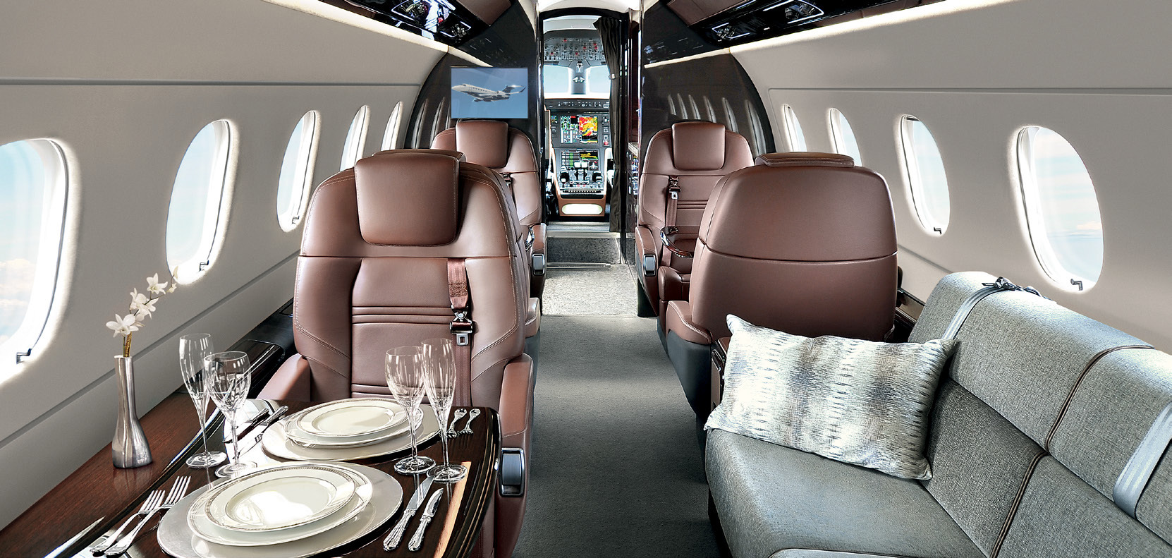 Interior cabin layout of the Embraer Praetor 600 super-midsize business jet.