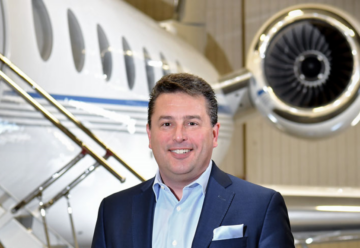 Joe Carfagna, Leading Edge Aviation Solutions, celebrates 1000 aircraft transactions.