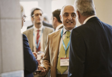 A picture of businessmen at a conference